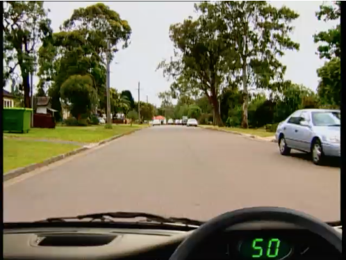 Suburban street, parked cars &mdash; hazard perception practice clip 36