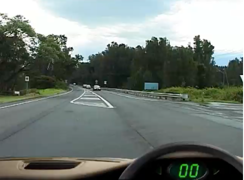 Wet highway, painted island &mdash; hazard perception practice clip 60